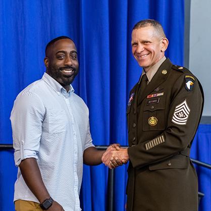 Pedro Gonzalez ’25 with Sergeant Major of the Army Michael A. Grinston at the University’s 2022 Veterans Day ceremony.